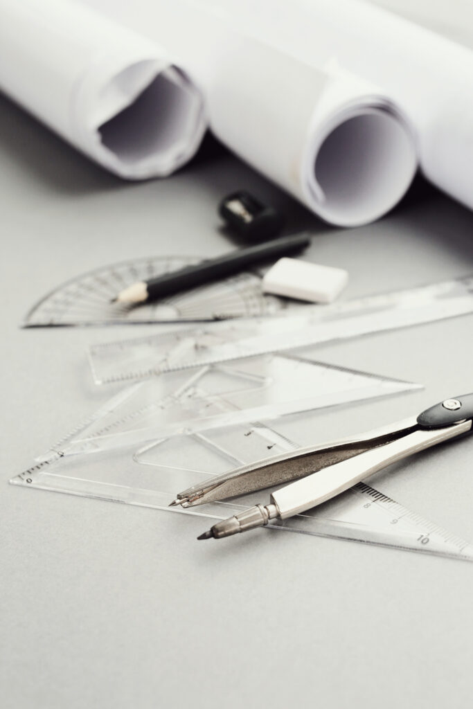 architect's drawing tools lying on a table ready to design storage solutions 